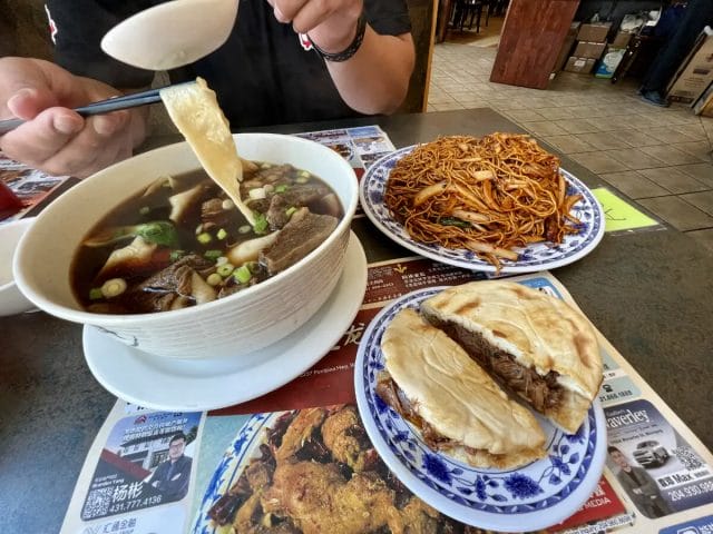 We still had enough left over for seconds after finishing our lunch! Featuring the #6 Noodle Soup with Braised Beef Brisket, #9 Noodle of Stir-Fried Lamb with Cumin and #1 Stewed Pork Burger. 